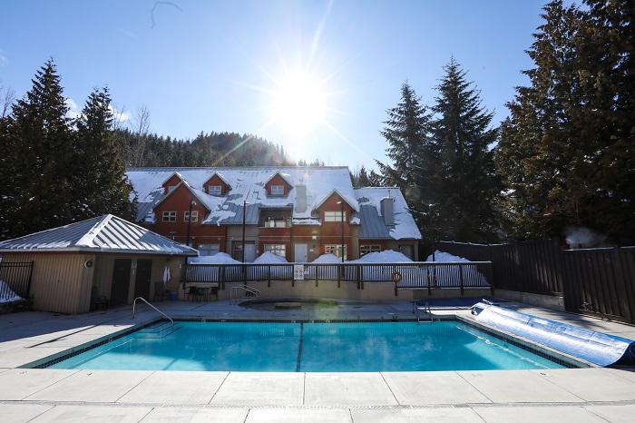 Lake placid lodge outdoor pool in Winter in Whistler