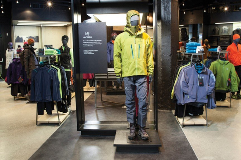 Inside a technical apparel store showcasing mens jackets on a mannequin